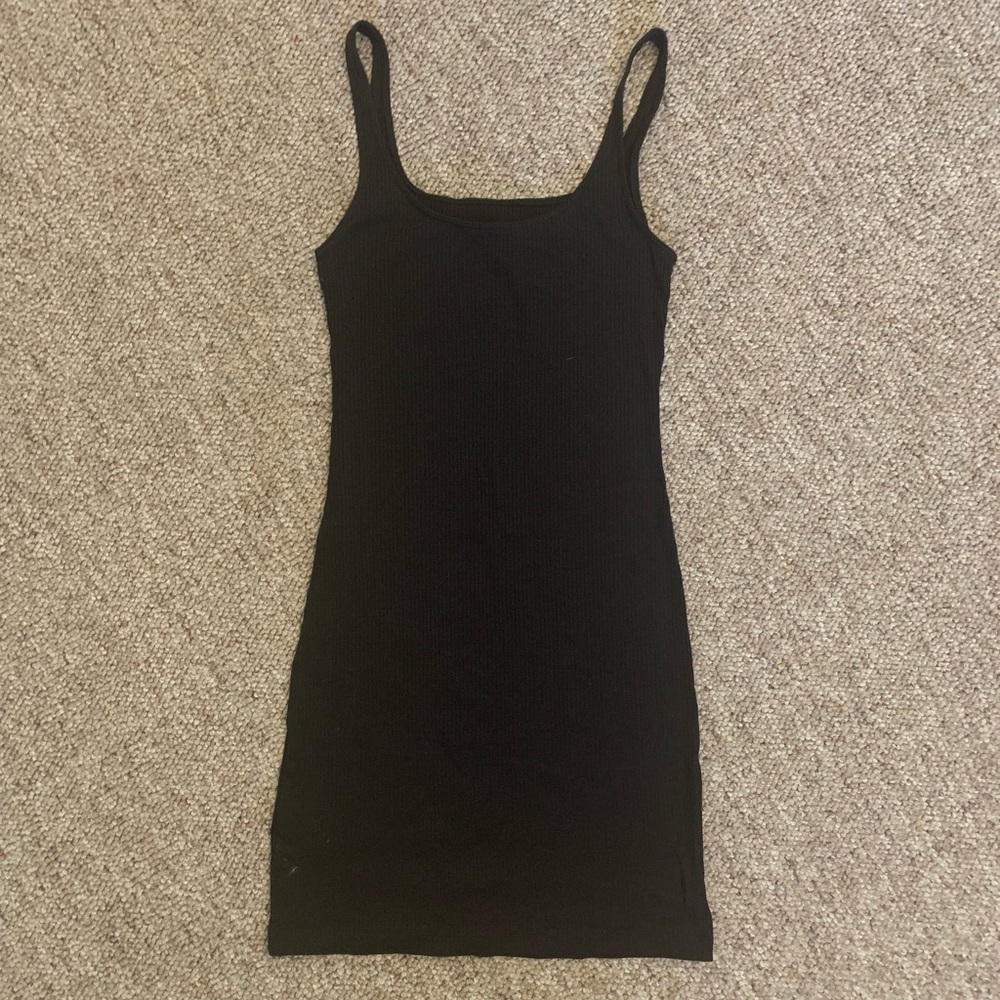 Black ribbed fitted dress from H&M. Never worn.
